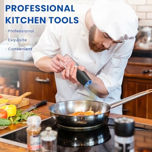 Chef seasoning food in a pan with professional kitchen tools.