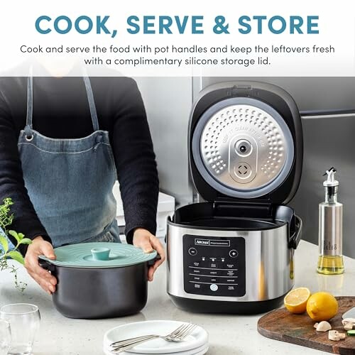 Person placing silicone lid on pot next to an open pressure cooker.
