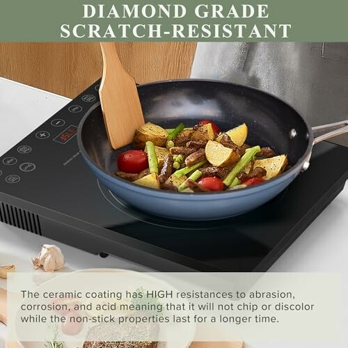 Non-stick frypan with vegetables on induction stove.