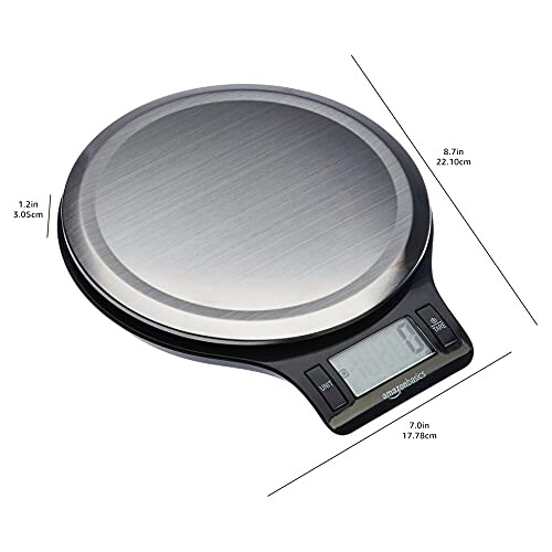 Digital kitchen scale with LCD display and measurements.