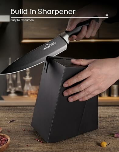 Knife being sharpened in a block with built-in sharpener