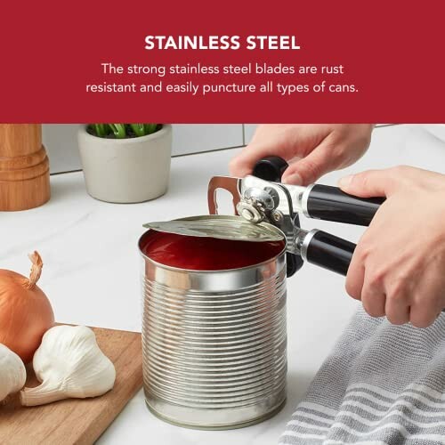 Person using a manual can opener on a tin can in a kitchen setting.