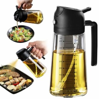 Oil dispenser bottle pouring over salad and grilled food.