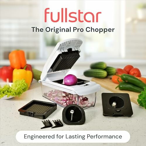 Vegetable chopper with various attachments and fresh produce.